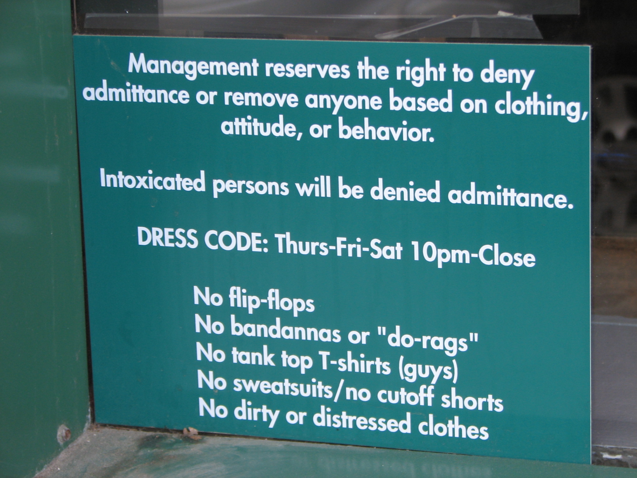 A sign outside a bar