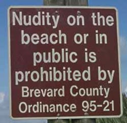 Signs warning against exposing oneself in public serve to increase awareness of acceptable practice.